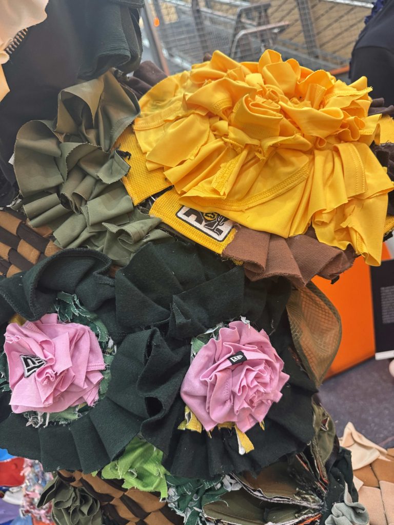 Close up view on the sculptures pink and yellow flowers.